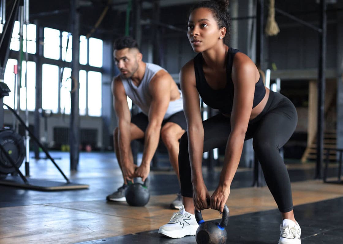 people lifting weights